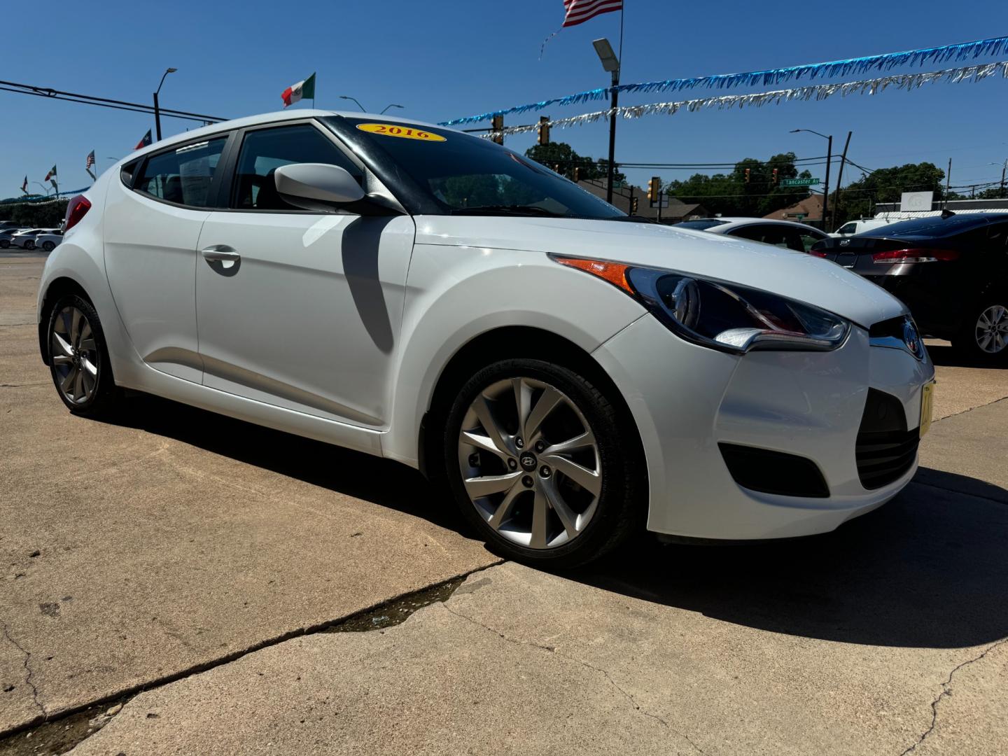 2016 WHITE /Gray HYUNDAI VELOSTER Base 3dr Coupe (KMHTC6AD7GU) with an 1.6L I4 engine, Automatic 6-Speed transmission, located at 5900 E. Lancaster Ave., Fort Worth, TX, 76112, (817) 457-5456, 0.000000, 0.000000 - This is a 2016 Hyundai Veloster Base 3dr Coupe that is in excellent condition. There are no dents or scratches. The interior is clean with no rips or tears or stains. All power windows, door locks and seats. Ice cold AC for those hot Texas summer days. It is equipped with a CD player, AM/FM radio, A - Photo#3